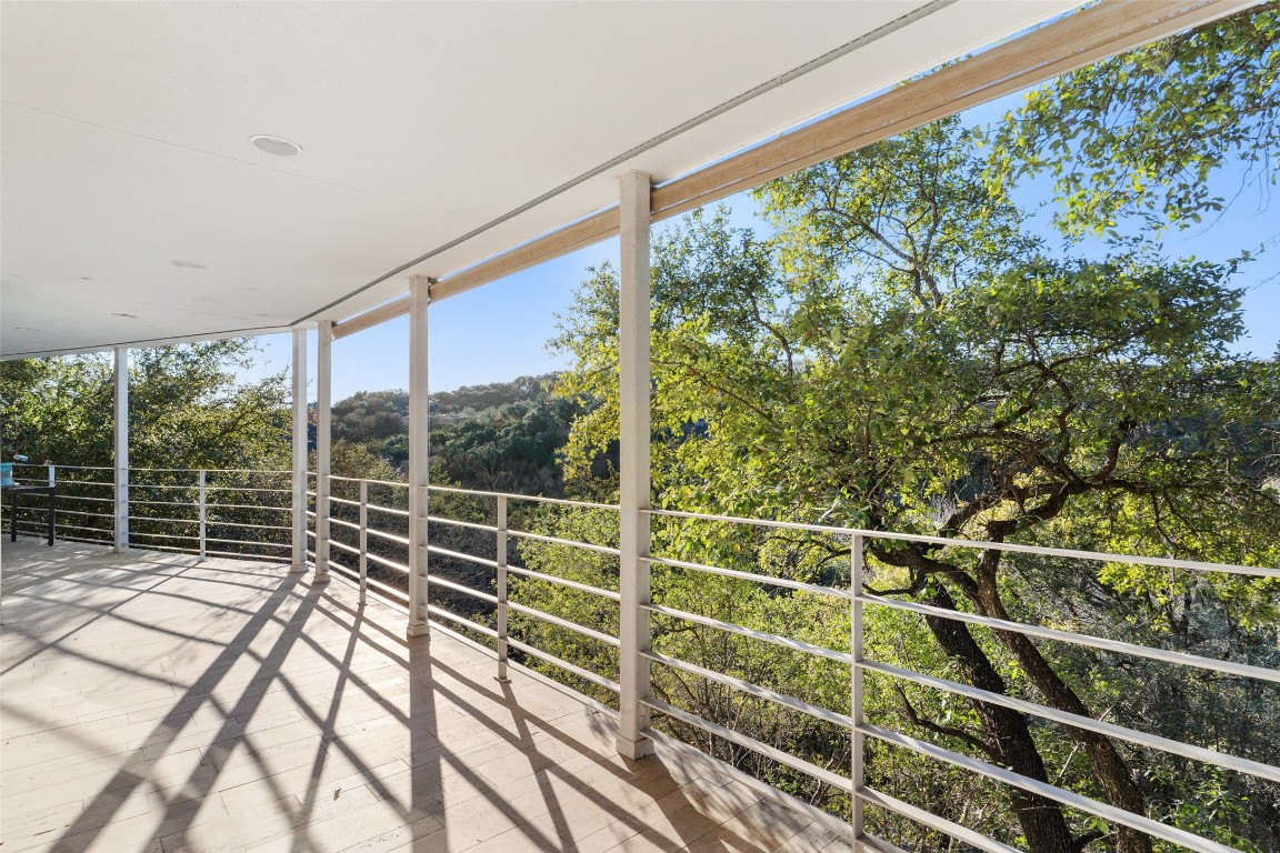 2102 North Oak Canyon Road Austin, TX 78746 - Photo 26 of 40 a view of a balcony