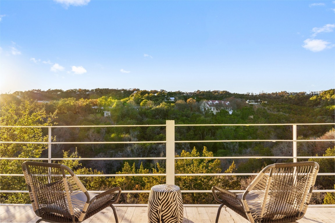 2102 North Oak Canyon Road Austin, TX 78746 - Photo 29 of 40 a view of a balcony with mountain view and mountain view