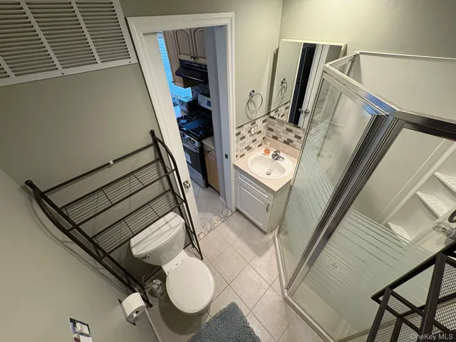 a view of living room with furniture and fireplace