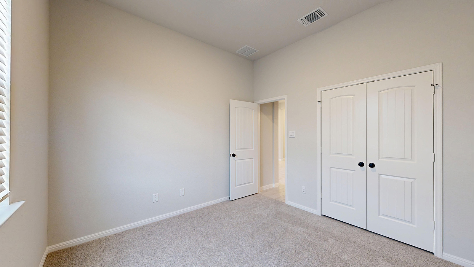 14537 Egon Road Salado, TX 76571 - Photo 16 of 27 Unfurnished bedroom with light colored carpet and a closet