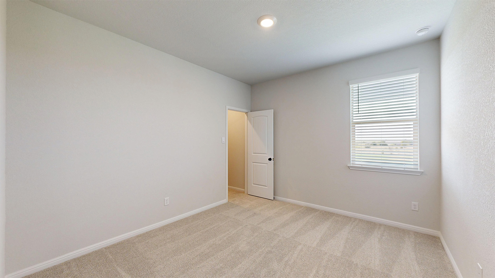 14537 Egon Road Salado, TX 76571 - Photo 21 of 27 Empty room featuring baseboards and light colored carpet