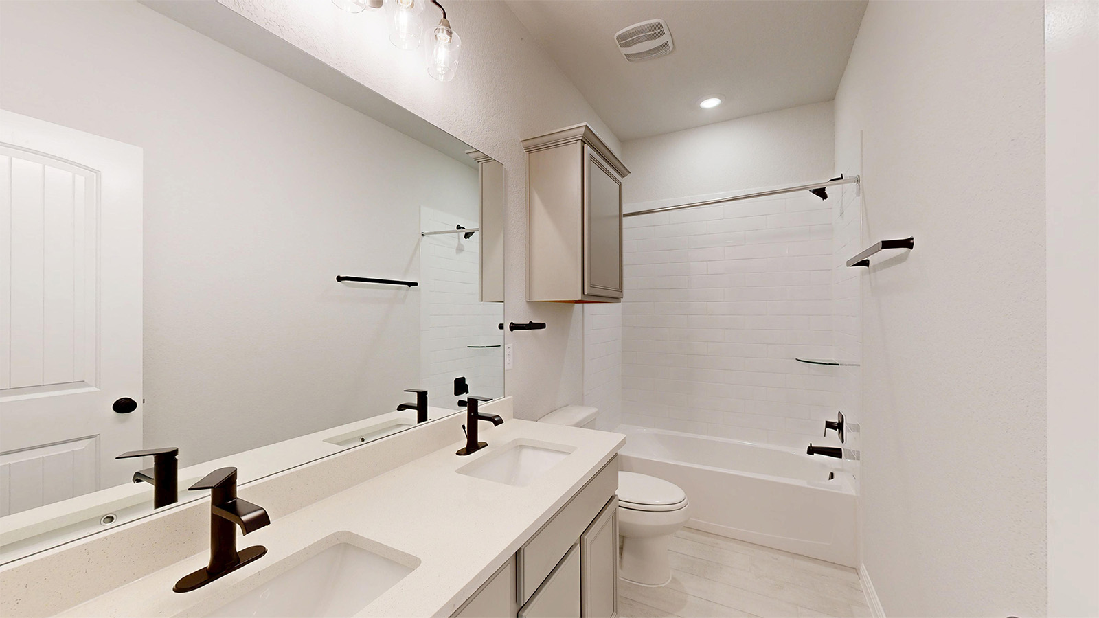 14537 Egon Road Salado, TX 76571 - Photo 23 of 27 Bathroom with double vanity and shower combination