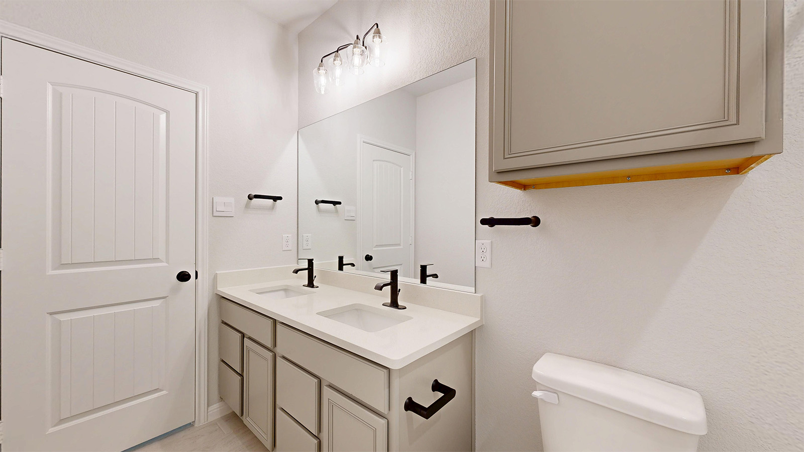 14537 Egon Road Salado, TX 76571 - Photo 24 of 27 Bathroom featuring double vanity and a textured wall