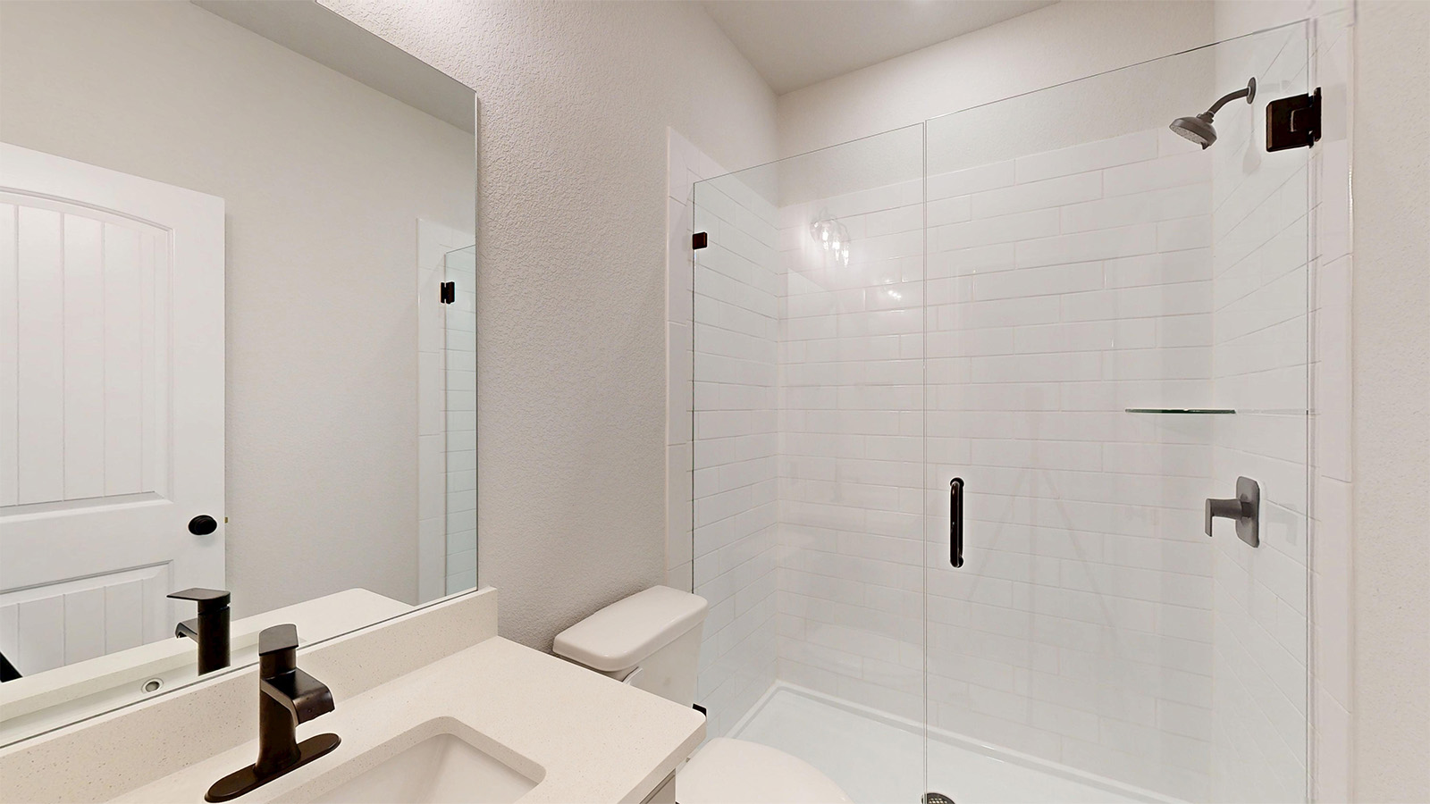 14537 Egon Road Salado, TX 76571 - Photo 25 of 27 Full bath with a stall shower, vanity, and a textured wall