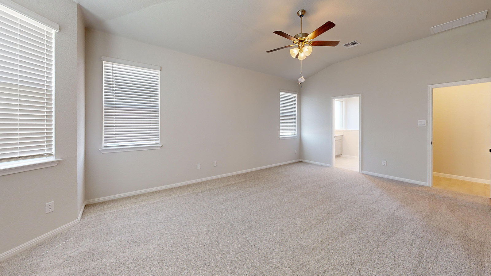 14537 Egon Road Salado, TX 76571 - Photo 10 of 27 Unfurnished bedroom featuring light carpet, lofted ceiling, a ceiling fan, and ensuite bathroom