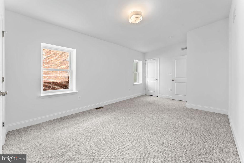 40 South Fulton Avenue Baltimore, MD 21223 - Photo 26 of 42 an empty room with a window