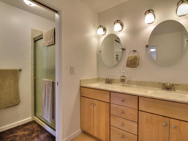 104 Rose Lane San Jose, CA 95127 - Photo 12 of 19 a bathroom with a granite countertop sink mirror and vanity