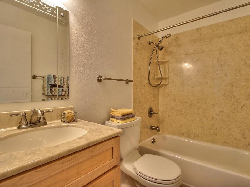 104 Rose Lane San Jose, CA 95127 - Photo 15 of 19 a bathroom with a granite countertop sink a toilet and shower