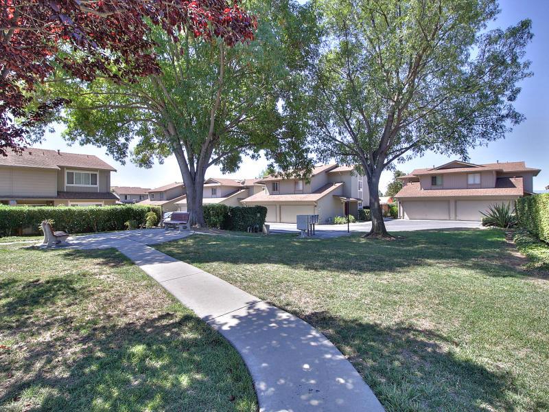 104 Rose Lane San Jose, CA 95127 - Photo 18 of 19 a front view of a house with a yard and tree s