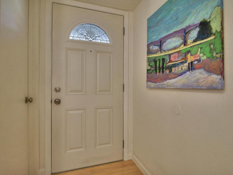 104 Rose Lane San Jose, CA 95127 - Photo 3 of 19 a view of a hallway with windows