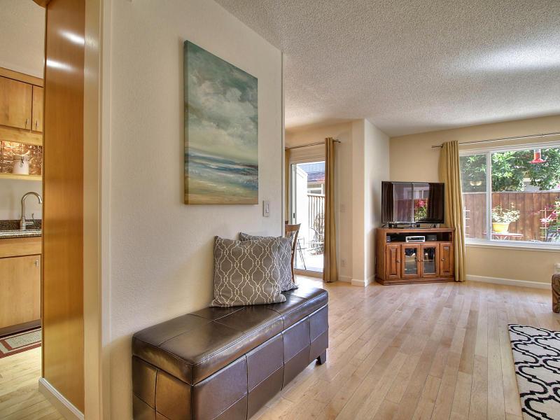 104 Rose Lane San Jose, CA 95127 - Photo 4 of 19 a living room with furniture and a flat screen tv