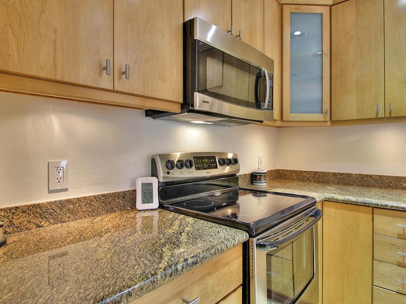 104 Rose Lane San Jose, CA 95127 - Photo 9 of 19 a kitchen with a stove and a microwave