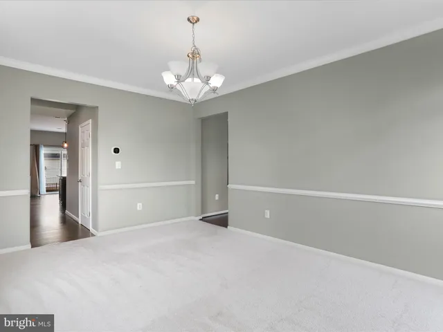 a view of a livingroom with a chandelier