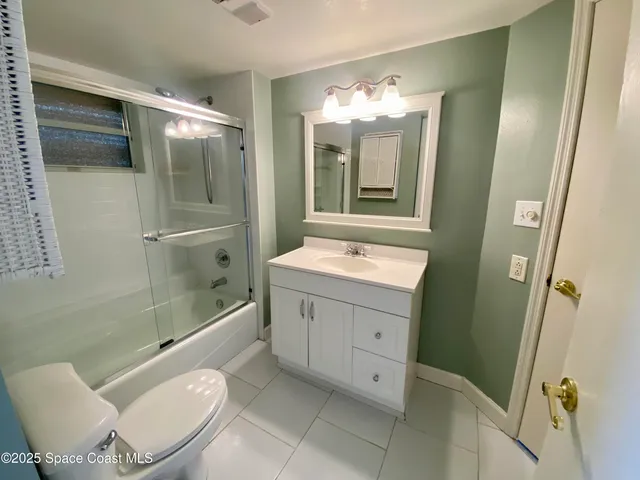 a view of a swimming pool with a yard