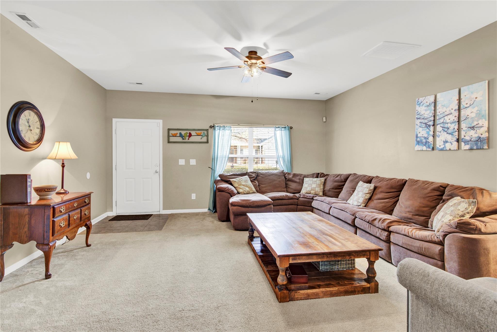 115 South Ranney Way Mooresville, NC 28117 - Photo 7 of 38 a living room with furniture and a window