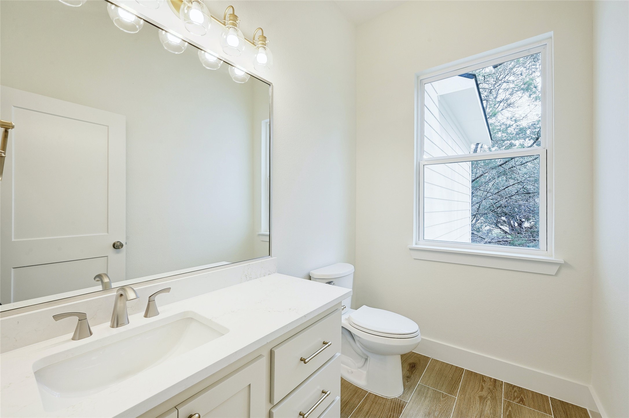 16 Rhapsody Lane Wimberley, TX 78676 - Photo 11 of 25 half bath off living room