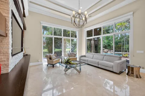 a bathroom with a double vanity sink a mirror and a bathtub