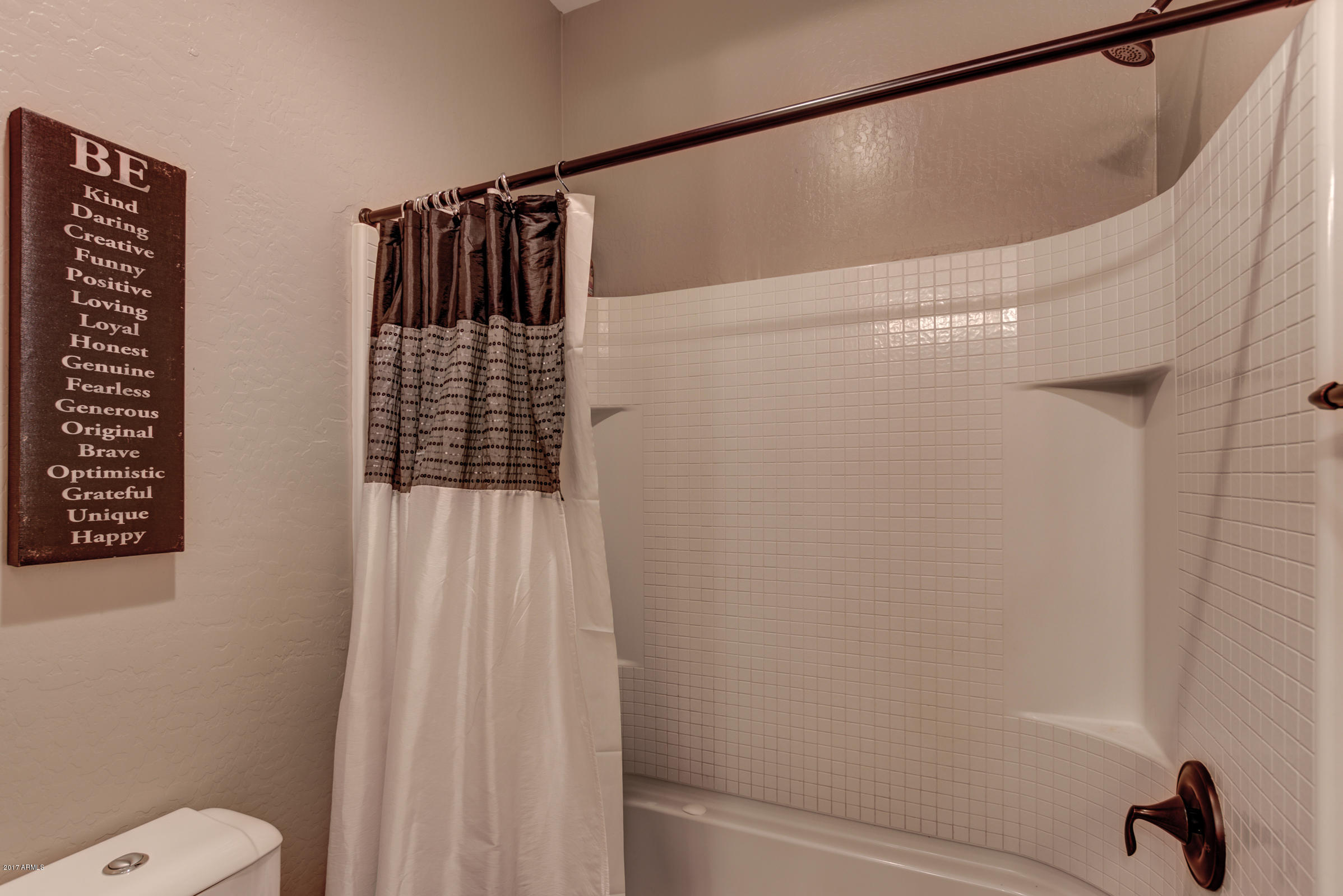 2906 East Blue Sage Road Gilbert, AZ 85297 - Photo 35 of 41 a bathroom with a shower and a toilet