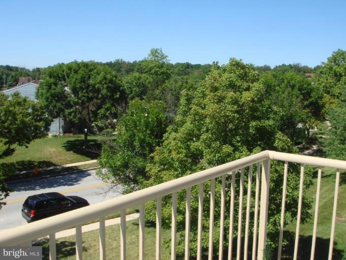 6470 Greenfield Road, Unit 1107 Elkridge, MD 21075 - Photo 2 of 7 Beautiful sunset view from top floor balcony