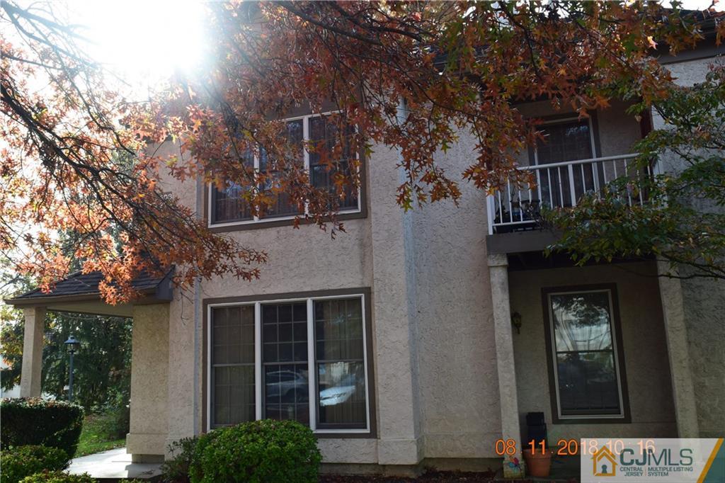 a view of a house with a tree front door