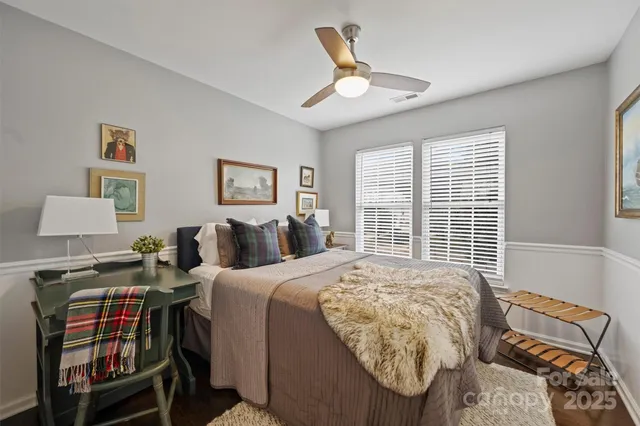 a bed room with a bed and a window