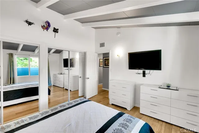 a view of living room with furniture and flat screen tv