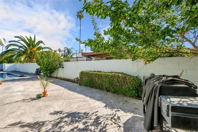 a house view with a outdoor seating space