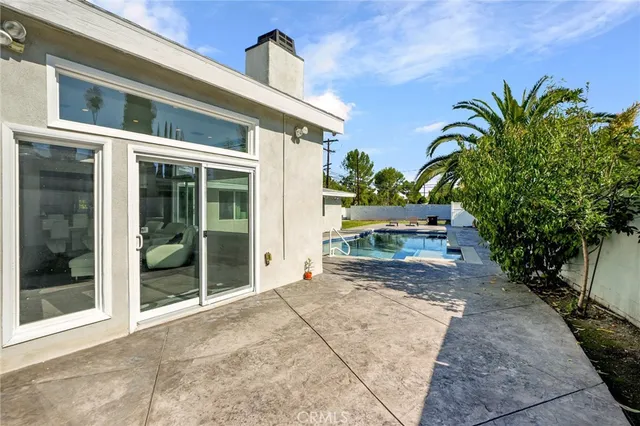 a house view with a outdoor seating space
