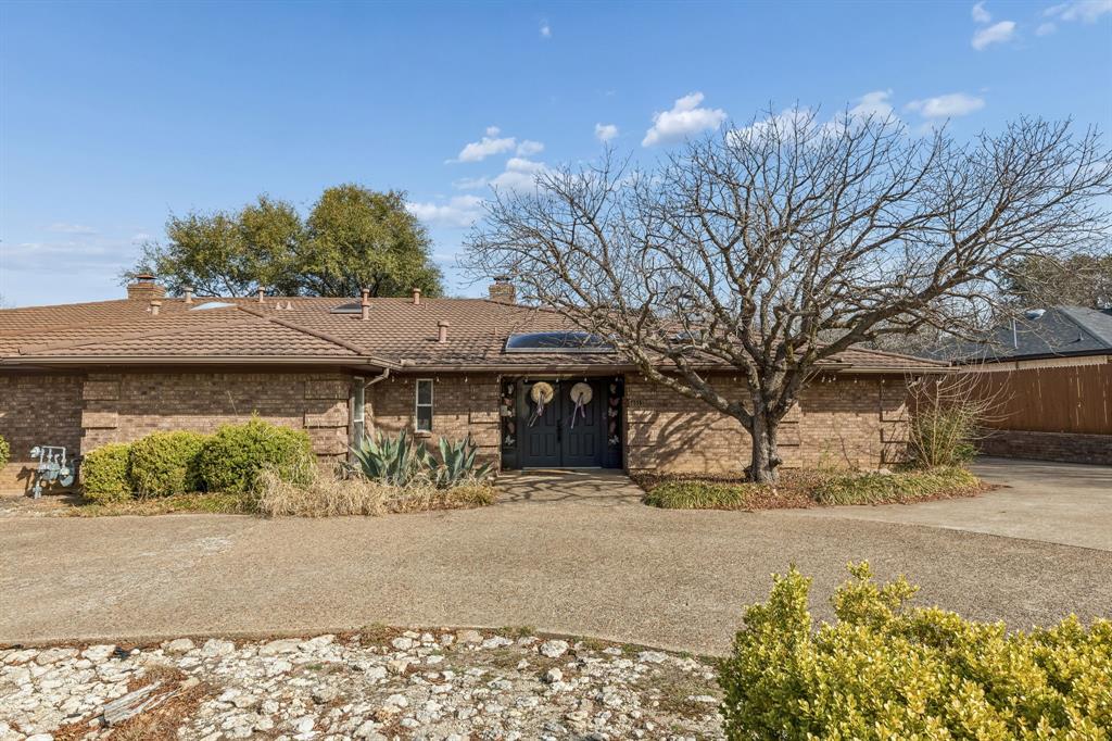 4512 Ranch View Road Fort Worth, TX 76109 - Photo 31 of 40 a view of a house with snow on the road