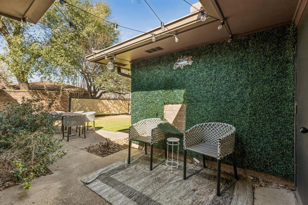 4512 Ranch View Road Fort Worth, TX 76109 - Photo 33 of 40 a view of a patio with table and chairs and potted plants