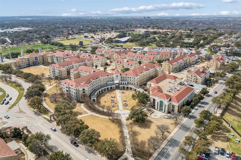 4512 Ranch View Road Fort Worth, TX 76109 - Photo 37 of 40 an aerial view of a swimming pool and mountain view in back