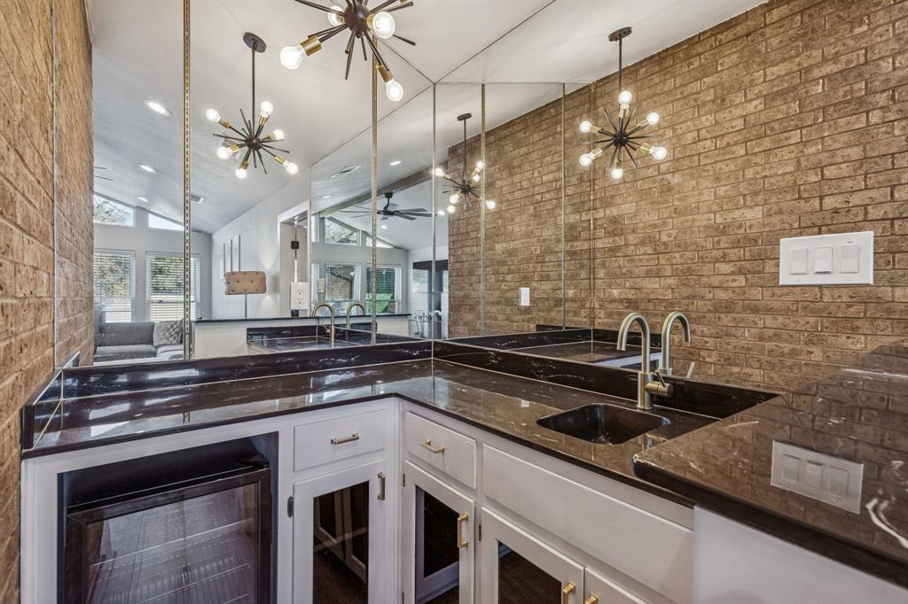 4512 Ranch View Road Fort Worth, TX 76109 - Photo 9 of 40 a kitchen with a sink cabinets and stainless steel appliances