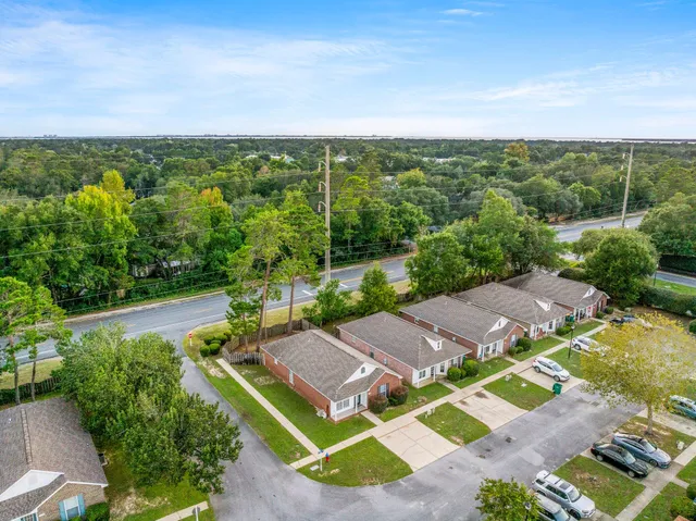 an aerial view of house with yard