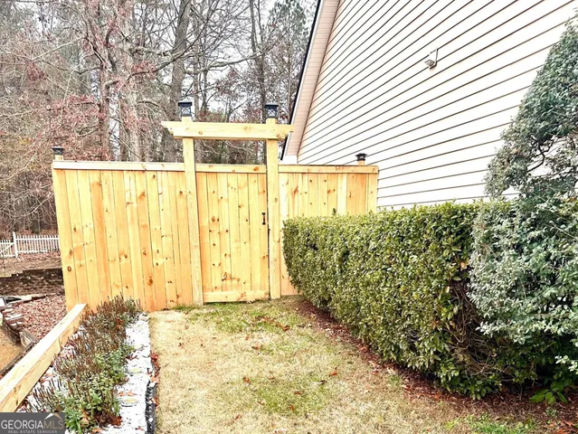 a view of a yard with trees