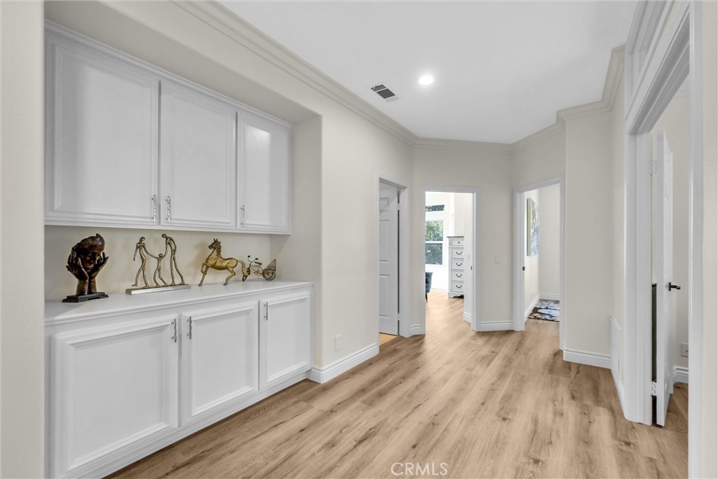 25672 Raintree Road Laguna Hills, CA 92653 - Photo 27 of 50 a view of a kitchen with wooden floor