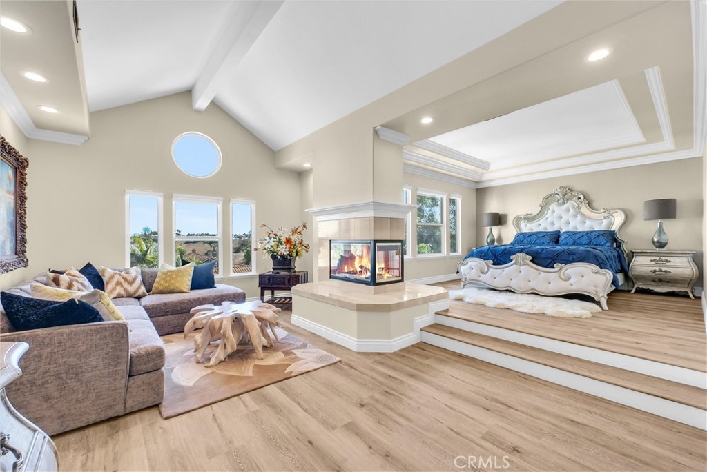 25672 Raintree Road Laguna Hills, CA 92653 - Photo 29 of 50 a living room with furniture and a large window