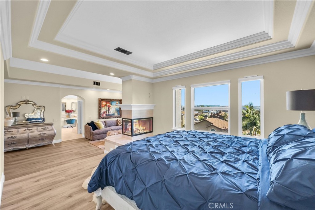 25672 Raintree Road Laguna Hills, CA 92653 - Photo 30 of 50 a view of a bedroom with furniture and window
