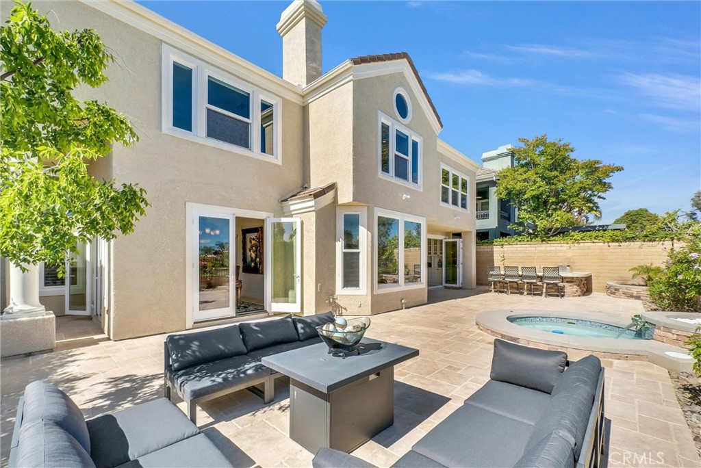 25672 Raintree Road Laguna Hills, CA 92653 - Photo 46 of 50 a view of a house with backyard and sitting area
