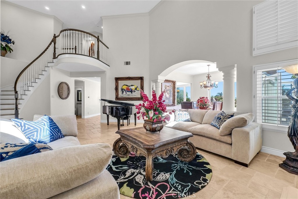 25672 Raintree Road Laguna Hills, CA 92653 - Photo 7 of 50 a living room with furniture and a potted plant