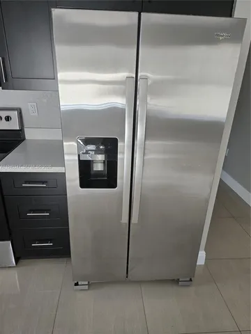 a utility room with washer and dryer