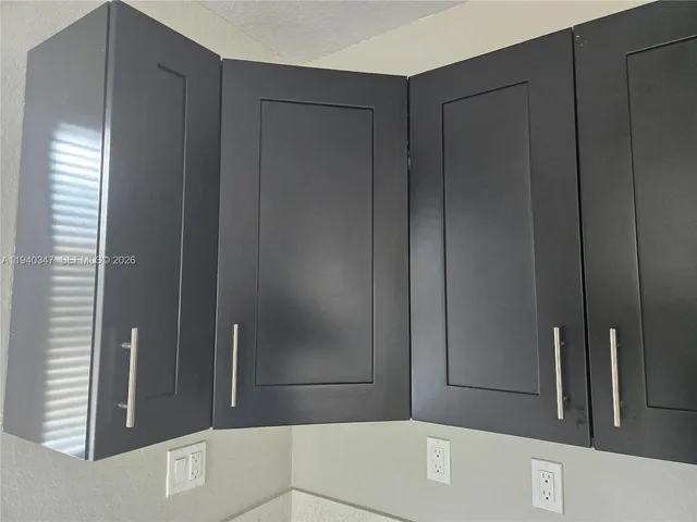 a bathroom with a tub and a shower