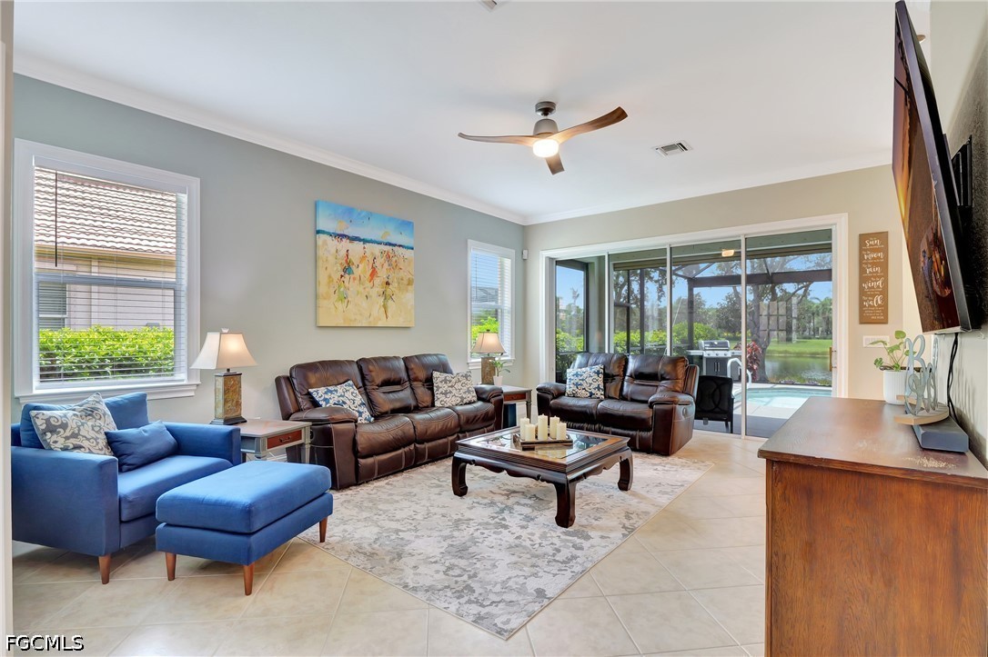 11230 Suffield Street Fort Myers, FL 33913 - Photo 7 of 42 a living room with furniture and a large window