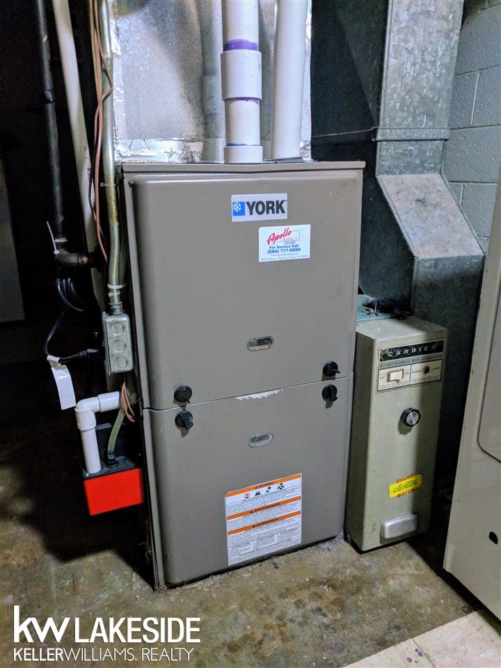 15580 Charles R Avenue Eastpointe, MI 48021 - Photo 22 of 23 Furnace and A/C are new in 2011. This furnace is 98.5% efficient!
