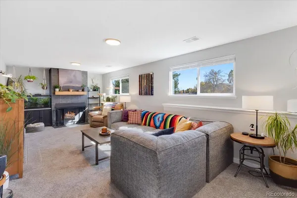 a living room with furniture and a couch