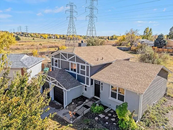 an aerial view of a house with a garden