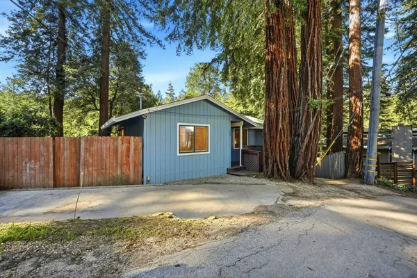 a house with a tree in front of it