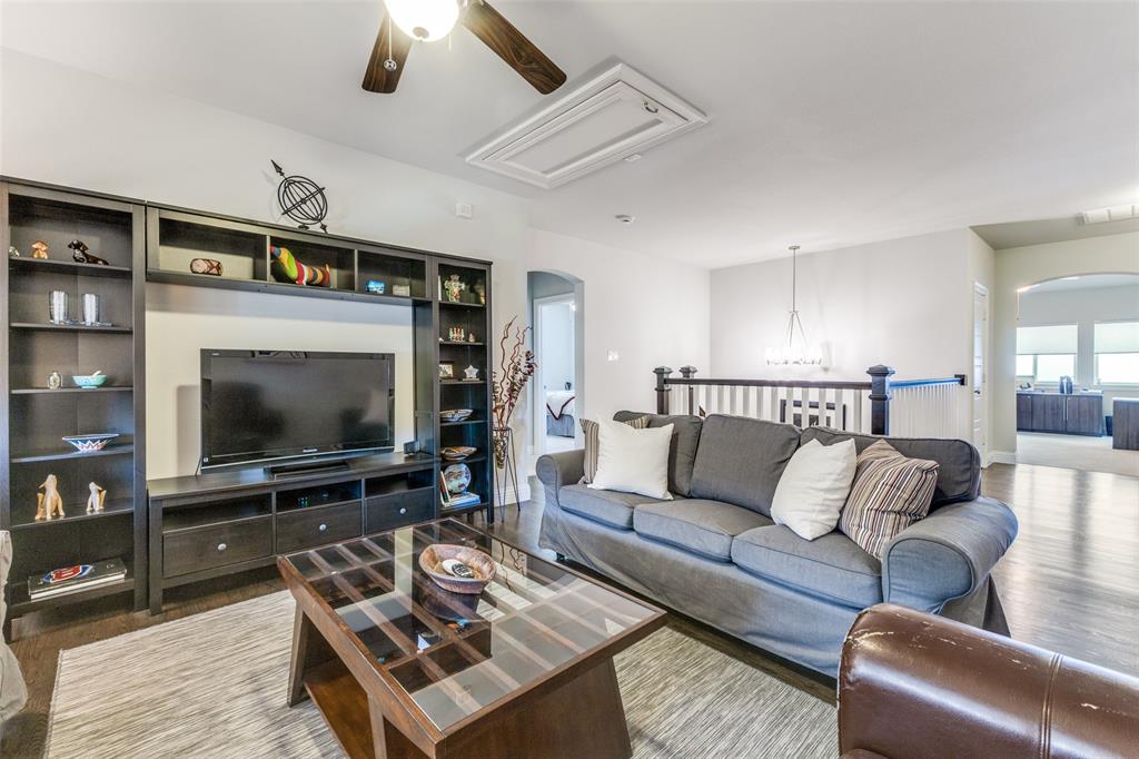 4008 North Cresthaven Road Dallas, TX 75209 - Photo 22 of 37 a living room with furniture and a flat screen tv