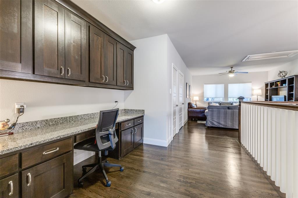 4008 North Cresthaven Road Dallas, TX 75209 - Photo 24 of 37 a view of a kitchen with furniture and wooden floor