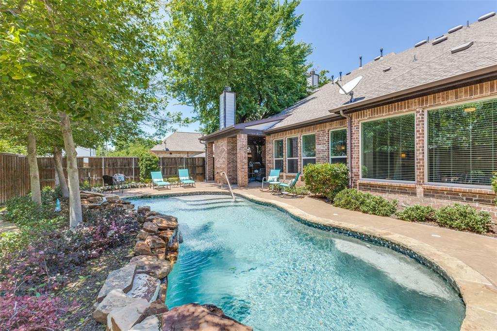 4008 North Cresthaven Road Dallas, TX 75209 - Photo 34 of 37 a front view of a house with garden