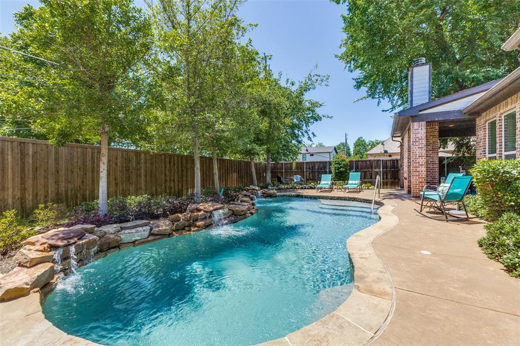 4008 North Cresthaven Road Dallas, TX 75209 - Photo 35 of 37 a view of a backyard with plants and a patio